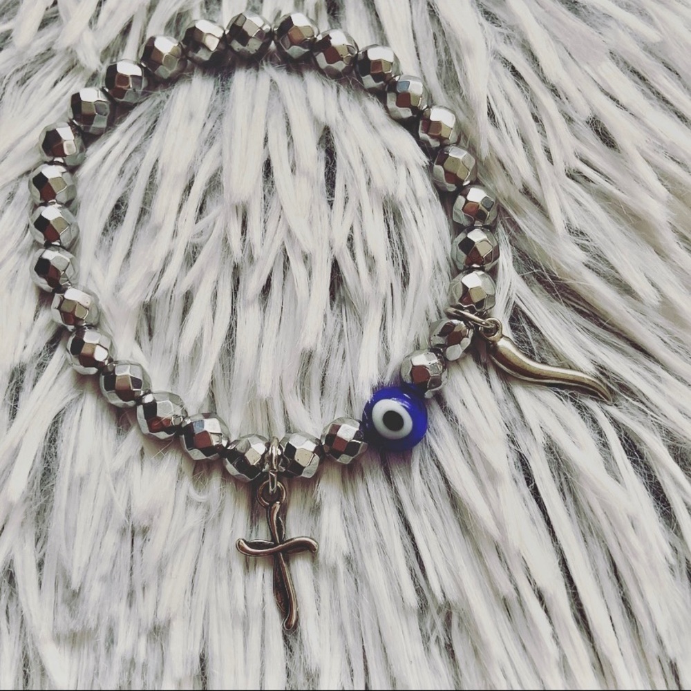 LUCIA PROTECTION BRACELET featuring faceted semi-precious silver hematites